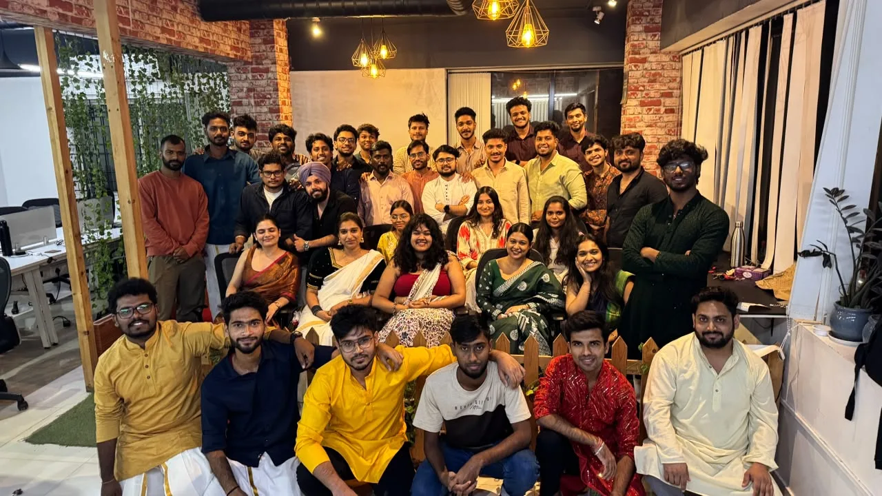 The whole Zethic team in traditional Onam dress at the Bengaluru office, 2026