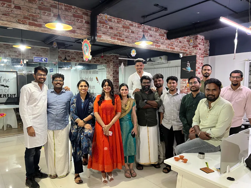 Zethic team in traditional dress inside the Bengaluru office