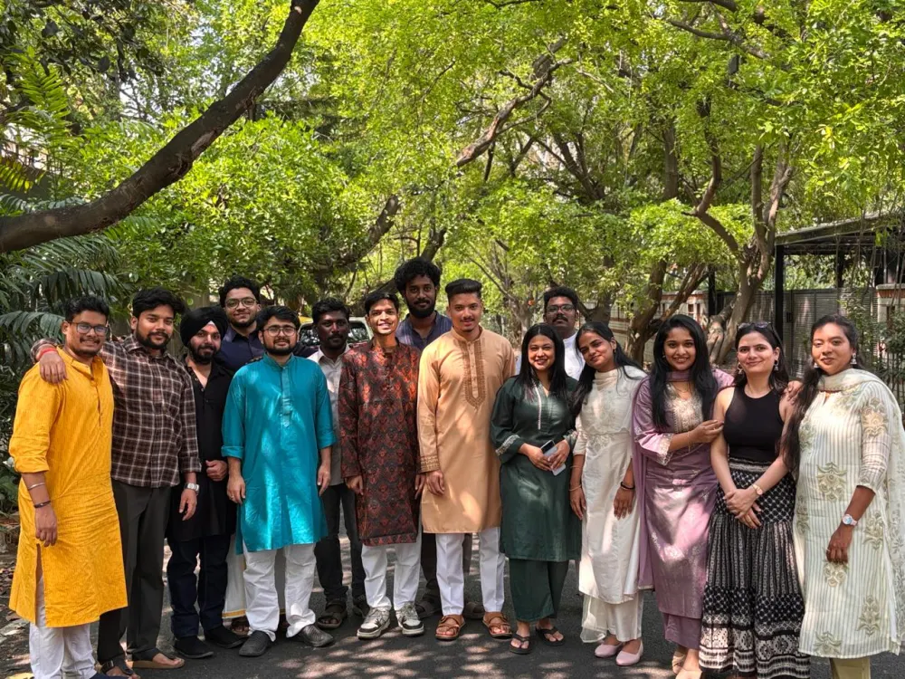 Zethic team in kurtas and sarees outdoors under the trees on ethnic day